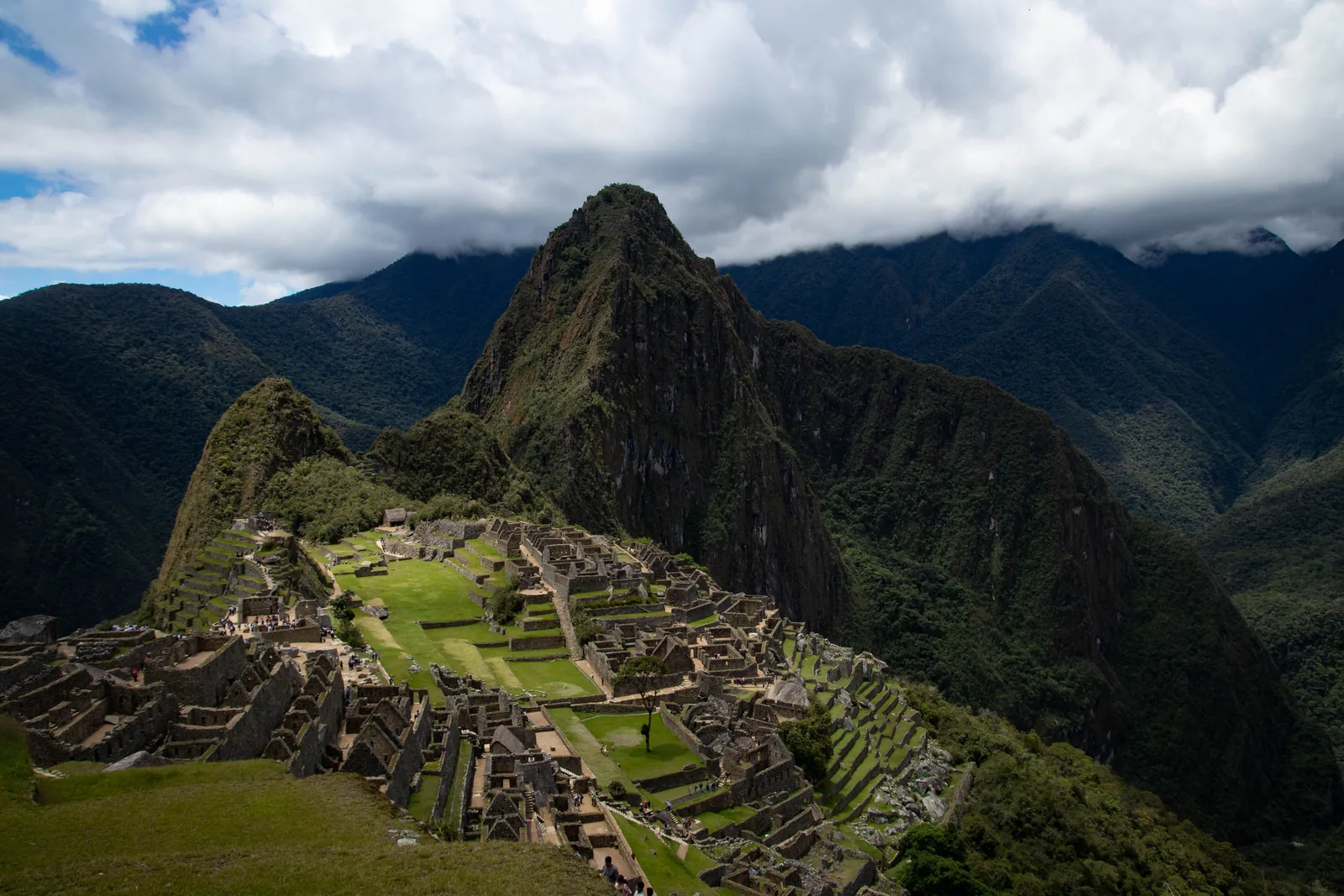 Machu Picchu citadel surrounded by green Andean mountains