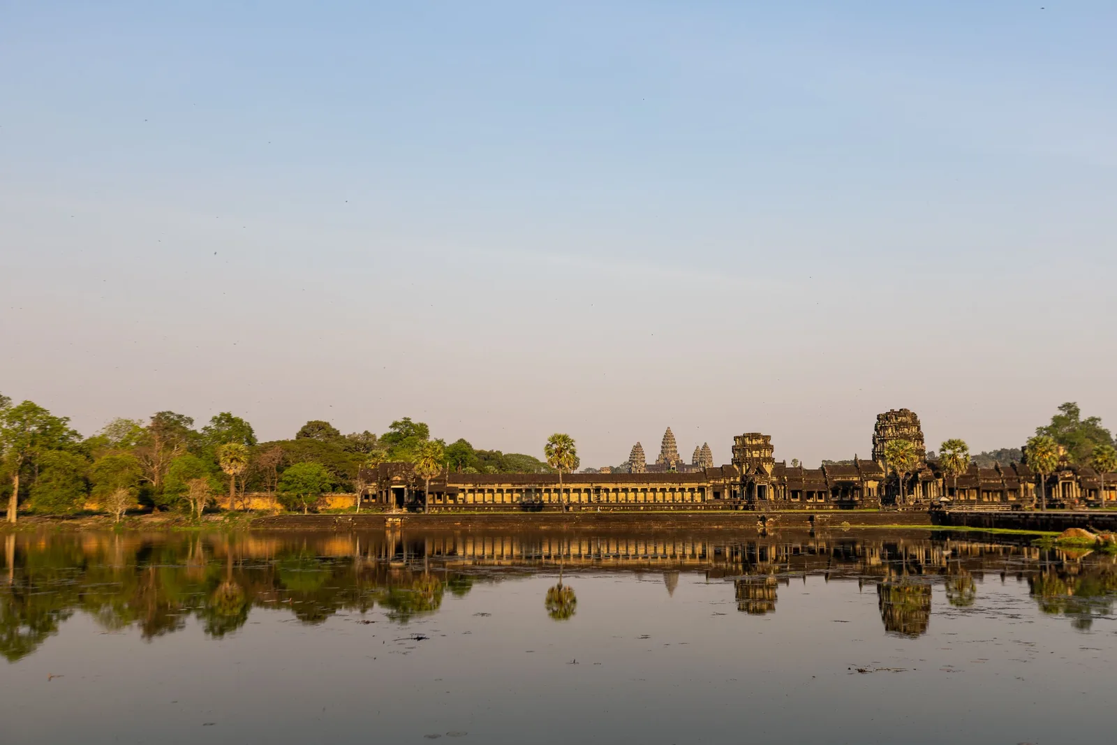 Angkor Wat temple reflected in the water at sunrise, Siem Reap, Cambodia