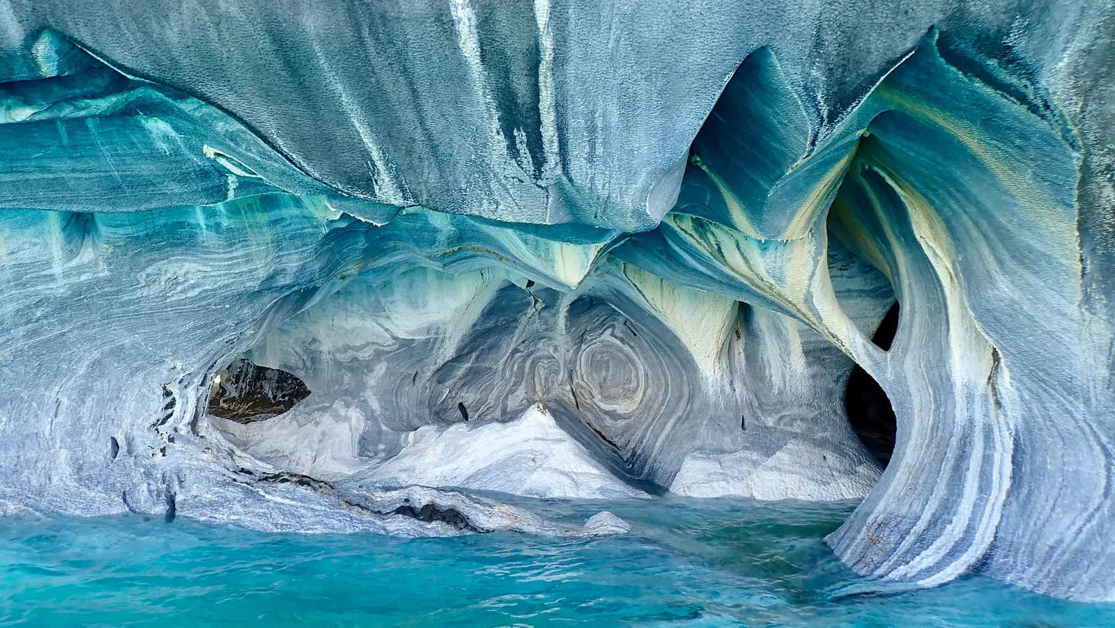 Marble cave formations above turquoise water on General Carrera Lake, Chile
