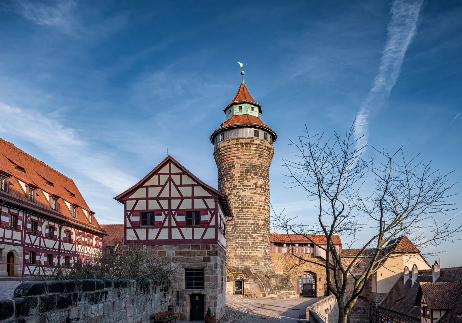 Nuremberg Castle and traditional Franconian architecture under a blue sky