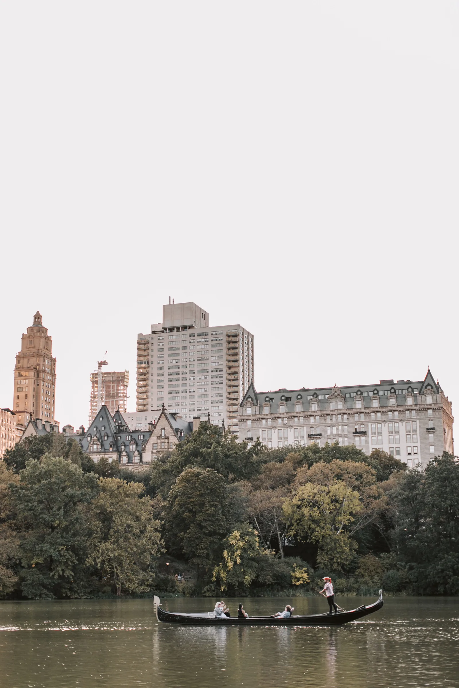 Central Park lake with the New York City skyline in the background