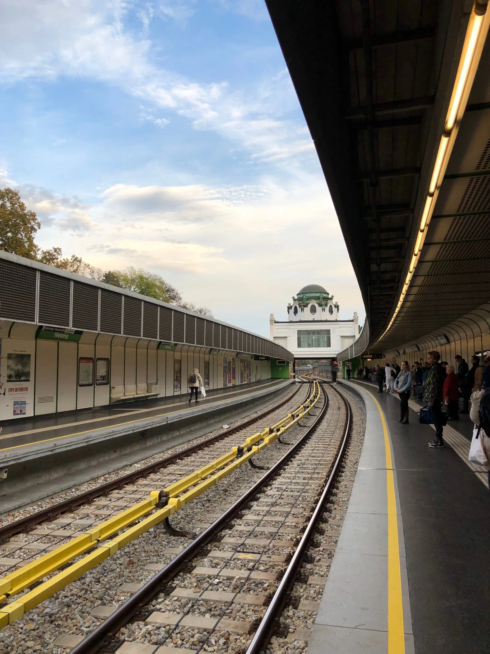 Passengers waiting at a Vienna metro station