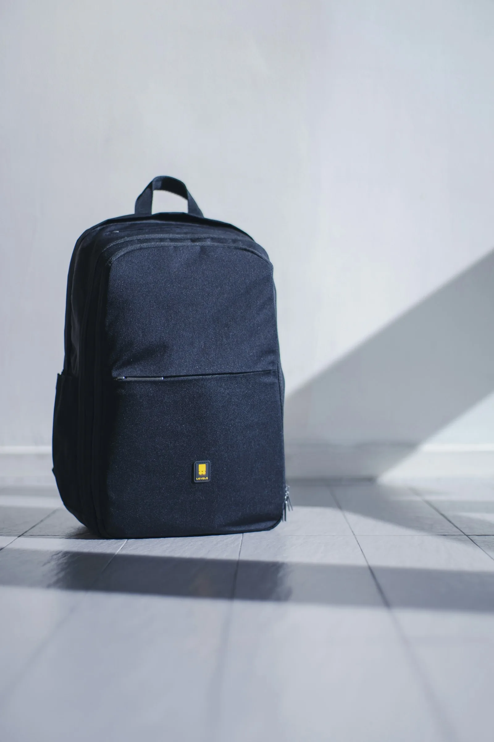 Open carry-on suitcase with neatly packed travel clothes